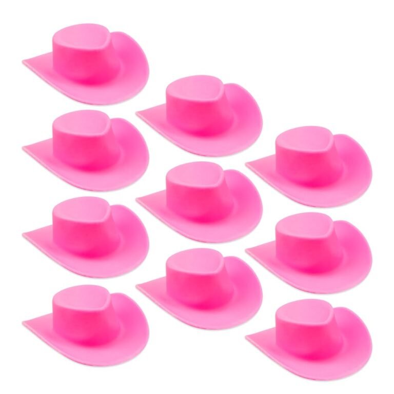 Nine pink cowboy hats arranged on a white background
