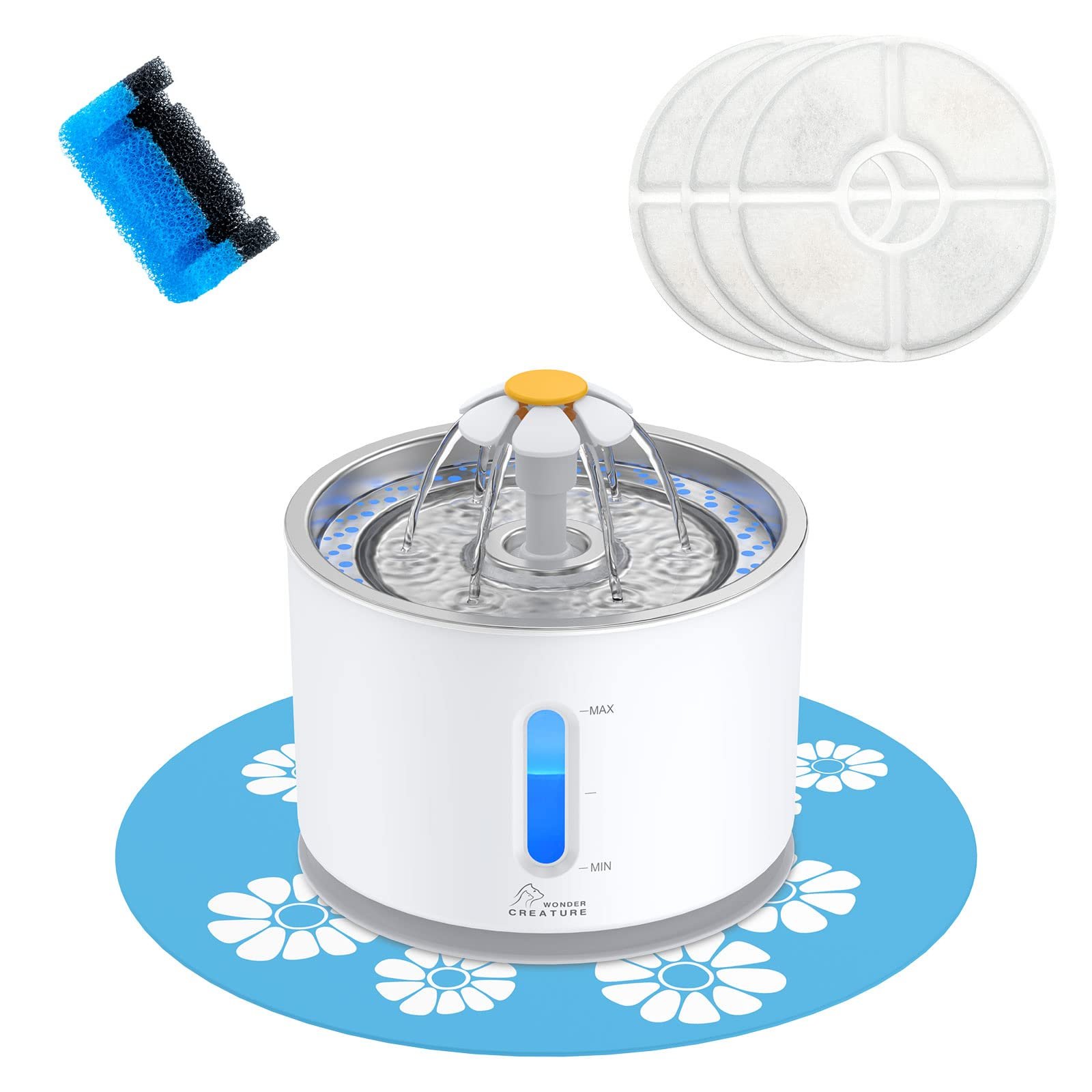 Pet water fountain with filters and cleaning sponge on a blue mat