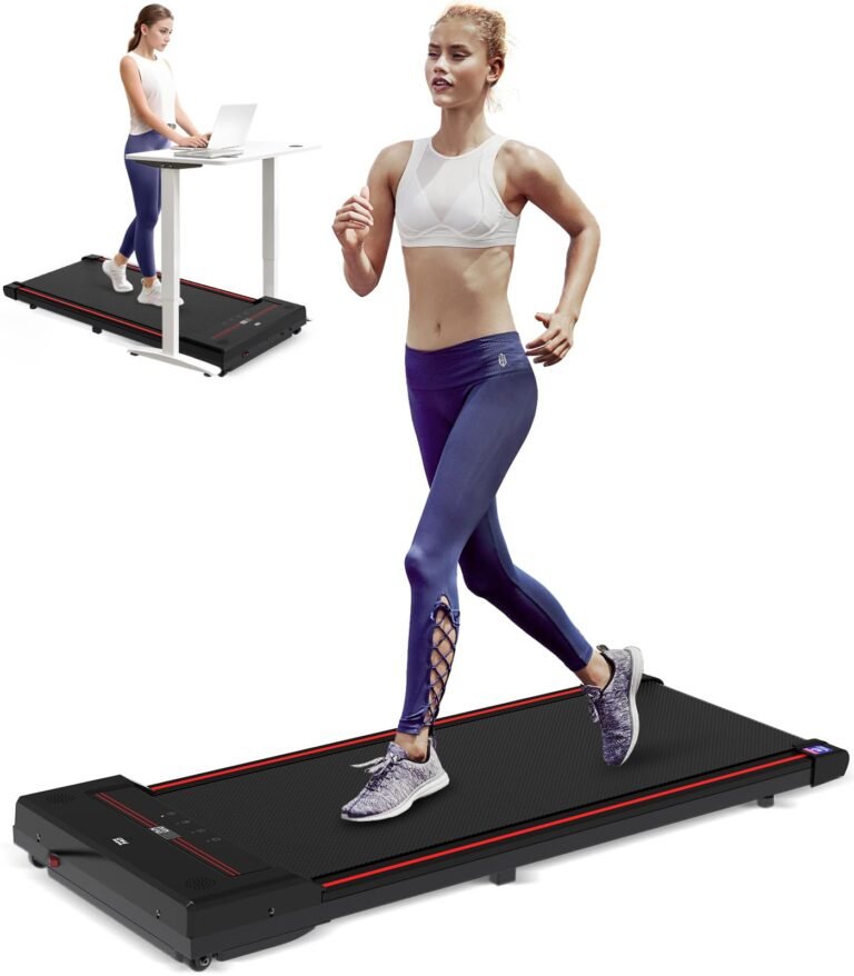 Woman running on a treadmill, another woman working at a standing desk