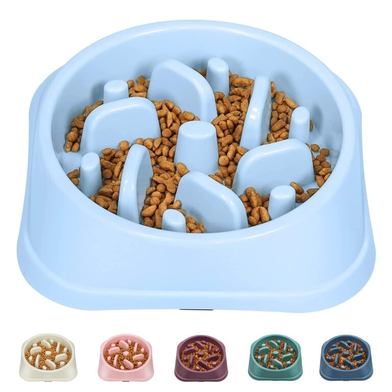 Blue slow feeder dog bowl filled with kibble and obstacles
