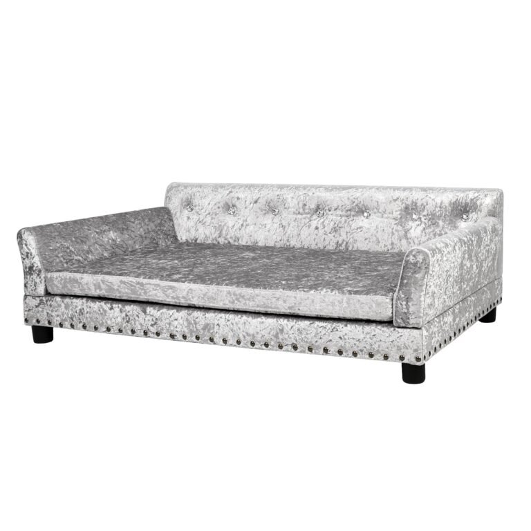 Silver crushed velvet dog sofa with button tufting and nailhead trim