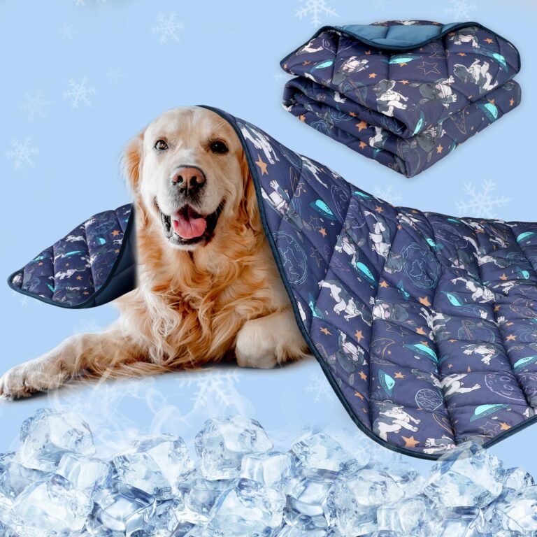 Golden retriever under a dog-themed blanket with ice cubes in the foreground